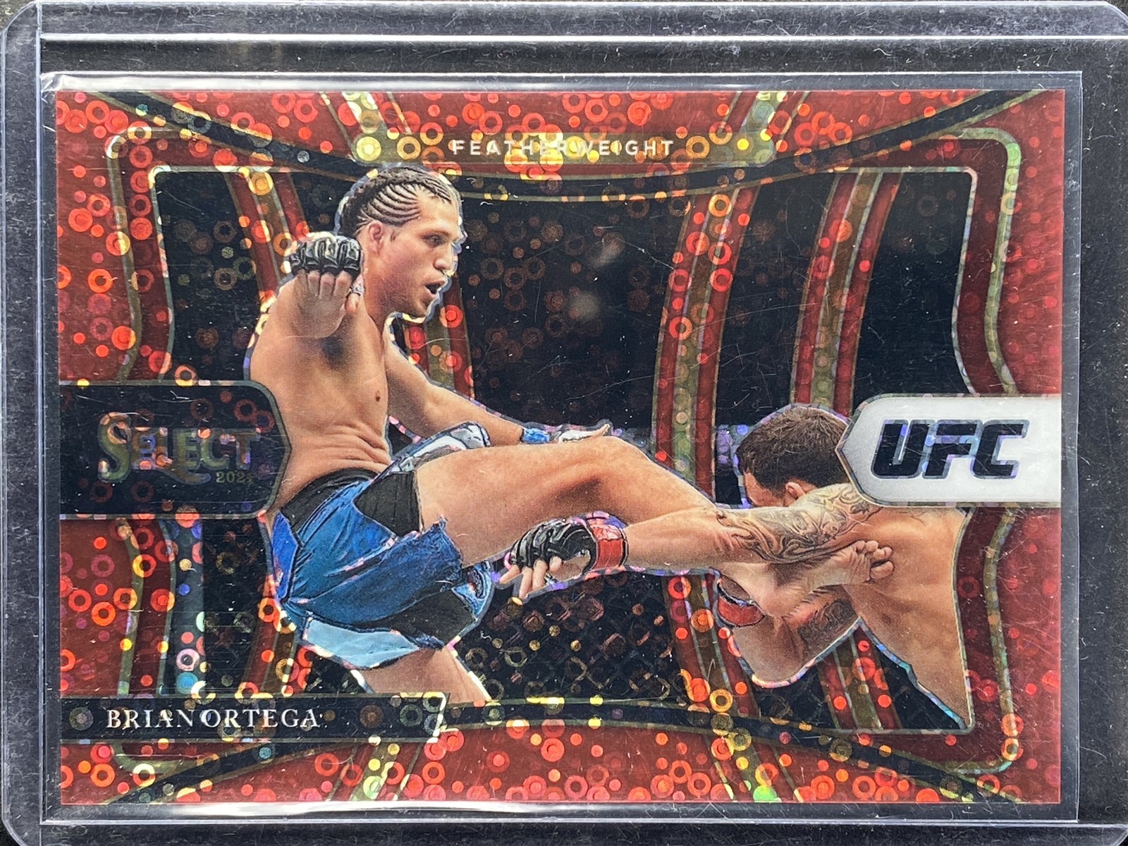 Ortega, Brian - 2021 Select UFC - Premier Level - Red Disco - 131/199
