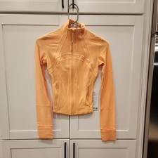 NWT Lululemon Define Nulu Jacket Coat Cropped Rock Melon Orange Yellow Size 0