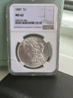 1887 Morgan Silver Dollar Philadelphia MS62 $1 NGC Beautiful Luster Cracked Slab