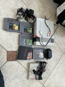 Nintendo NES Console Lot with Controllers, Taito Arkanoid, Super Mario Bros.