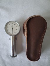 Vintage rubber hardness tester with a leather case