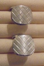 Manschettenkn&ouml;pfe Schmuck silberfarbend in sich gemustert halbrunde Form Nr.4265