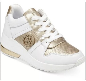 guess white and gold sneakers