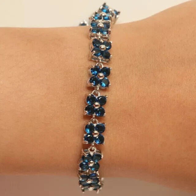 Теннисный браслет 7 карат круглый созданный в лаборатории с голубым топазом и цветком покрытие белым золотом 14 карат - Изображение 2 из 4