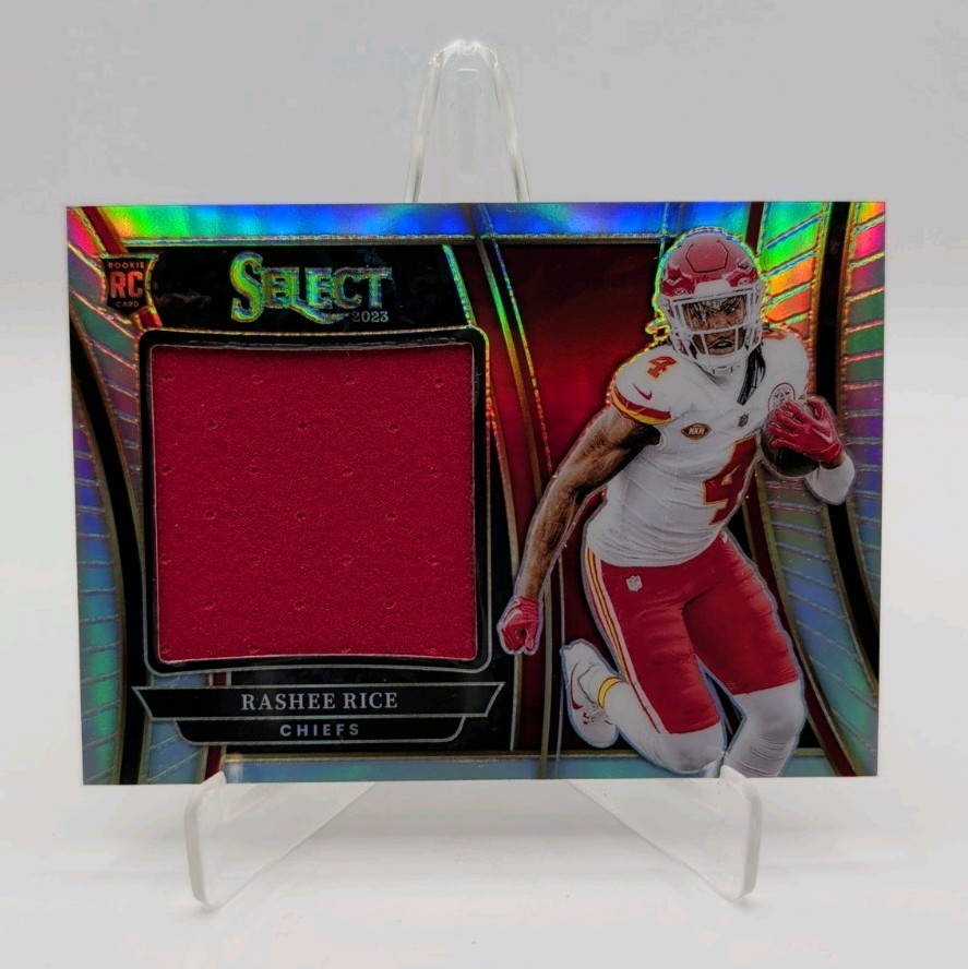 2023 Panini Select - Rookie Swatches Rashee Rice #SWA-RRI Silver Prizm /99