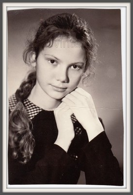 Pretty young girl teen Long hair Braid Beautiful face pose Studio vintage photo