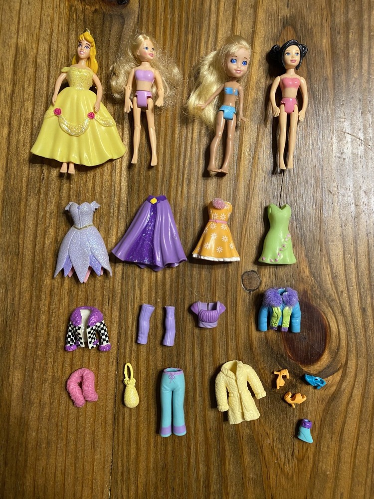 Polly Pocket Doll And Rubber Clothing Lot