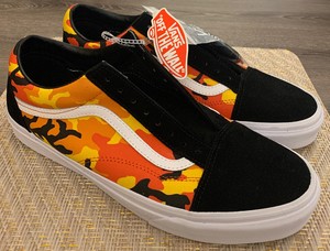 orange and black vans old skool