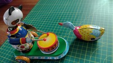 Two Wind Up Tin Toys Vintage Panda Banging Drum & Swimming Duck Includes One Key