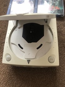 Dreamcast Console 2x controllers, leads and 4 games. (Working)