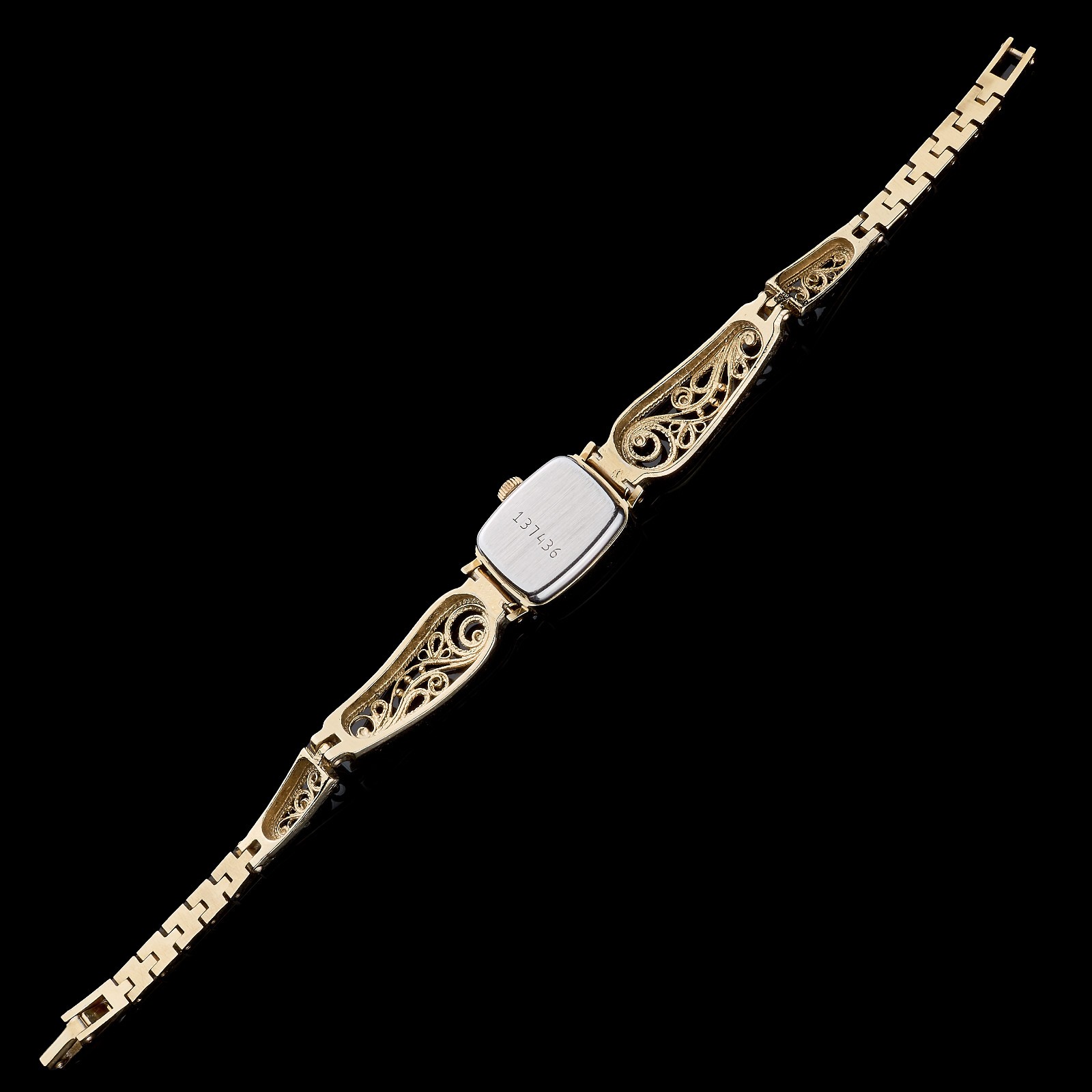 Small women's cocktail watch with gold color. Vintage women's mechanical watch.