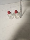 A Group Of 4 Salt And Pepper Shakers — photo 7