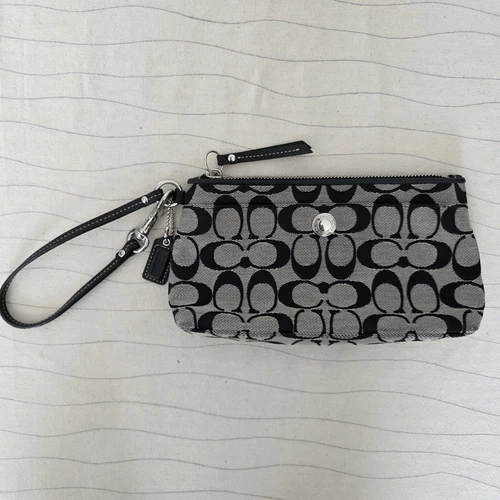 Portafoglio Coach donna nero bianco tessuto zip pochette pelle braccialetto