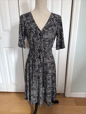 POLKADOT WRAP DRESS Ralph Lauren black and white spandex wrap dress size 8