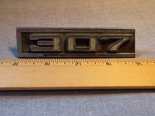 Vintage Chevygmc 307 Emblem -right Side- Used.