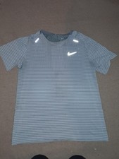 Nike Running Top Size Medium. A Few Marks. See Description