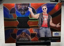 2024 Panini Select WWE - Selective Swatches LA Knight #SW-LAK Red Prizm /99
