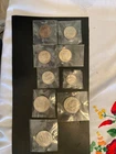 Silver half and quarter dollars plus multiple Eisenhower dollars nine pieces alt
