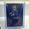 2025 Panini Select - Rookie Swatches Jaxson Dart #RSW-JDT Blue Prizm (MEM, RC)