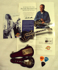 Gibson Guitar Collection avec guitare miniature, 3 pics guitare et affiches Frampton