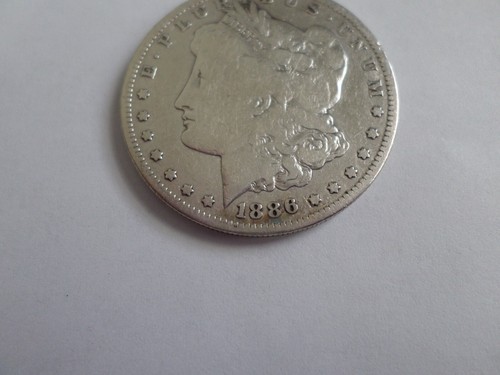Low Mintage G/VG Morgan Dollars 1886-S Coin in circulated condition!