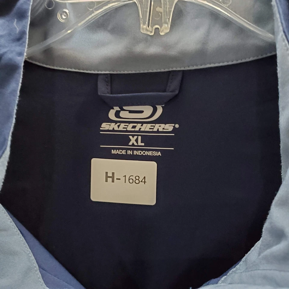 Chaqueta cortavientos Skechers para hombre XL naranja azul marino bloque de color 1/4 cremallera cuello falso Foto 2 de 4