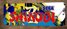 a Shinobi Arcade 4x12 Metal Wall Video Game Sign