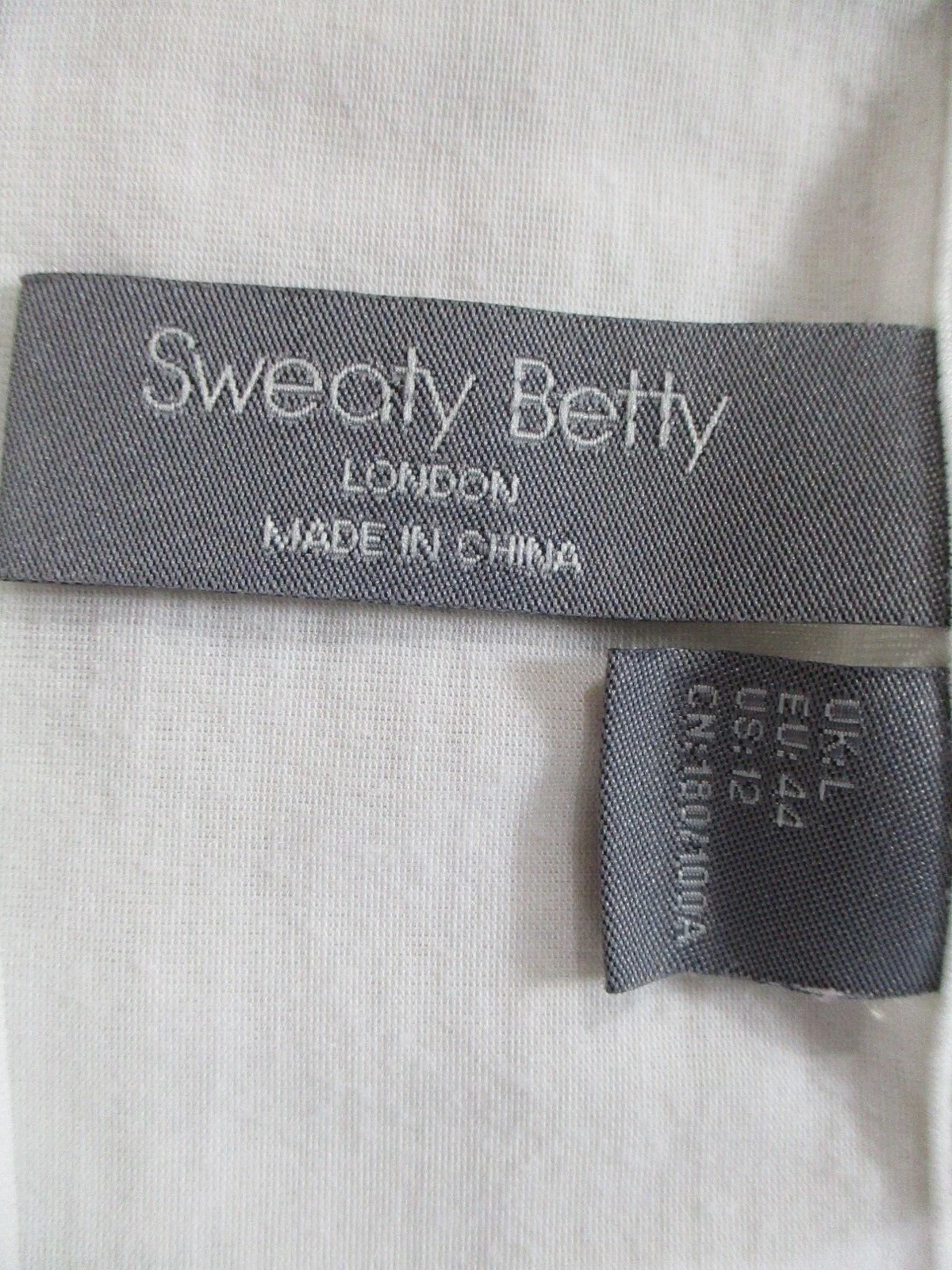 sweaty-betty long sleeve high low crew neck stretch solid shirt