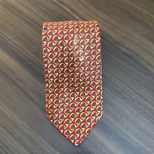 Burberrys Red Silk Tie With Yellow All Over Chain Print Made In The U.K.
