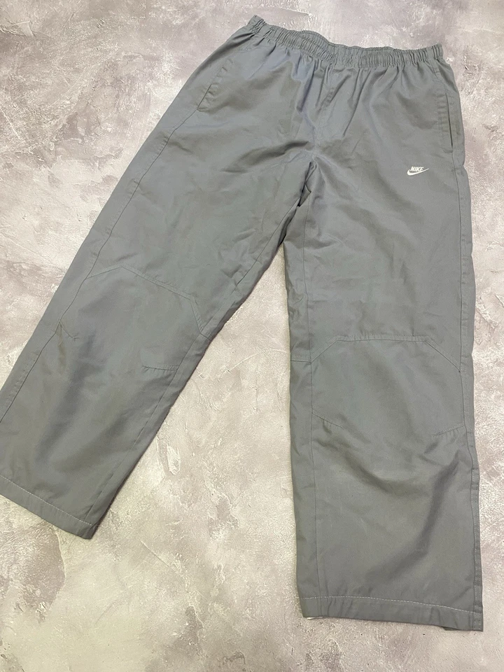 Pantalones deportivos holgados Nike vintage años 90 talla M gris cremalleras nailon Y2K bombo Foto 2 de 4