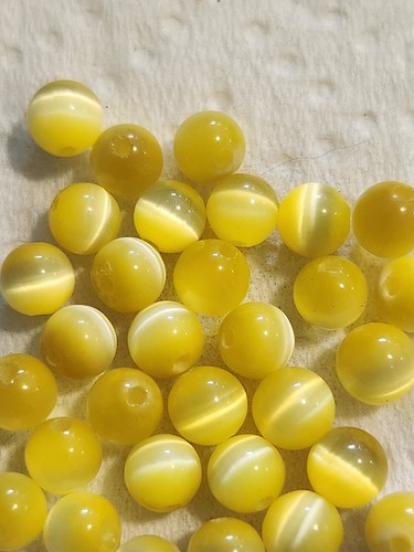 Unbranded Synthetic Fiber Optic Beads 5.8-6.2mm 32 Pcs Yellow Cat's Eye - Picture 3 of 3