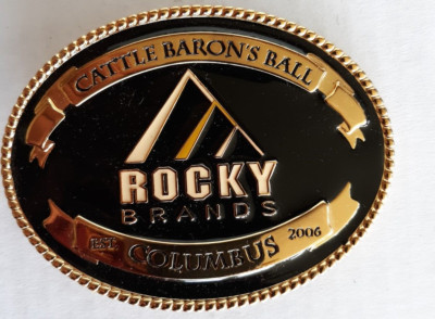 2006 brass Rocky Brands Cattle Baron's Ball Columbus belt buckle 4'' long