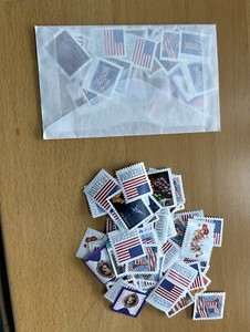*REDUCED* 400 uncancelled US postage off paper **NOT COUNTERFEITS**