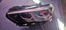 BMW X5 Passengerside Front Headlight Slighty Damaged (See Images)