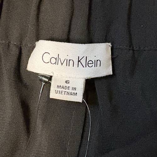 Falda plisada Calvin Klein para mujer 6 negra cintura elástica gasa fluida nueva con etiquetas - Imagen 8 de 15