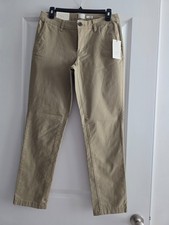 A New Day Khaki pants, Size 4 R, Mid Rise Slim Hip and Thigh New with tags