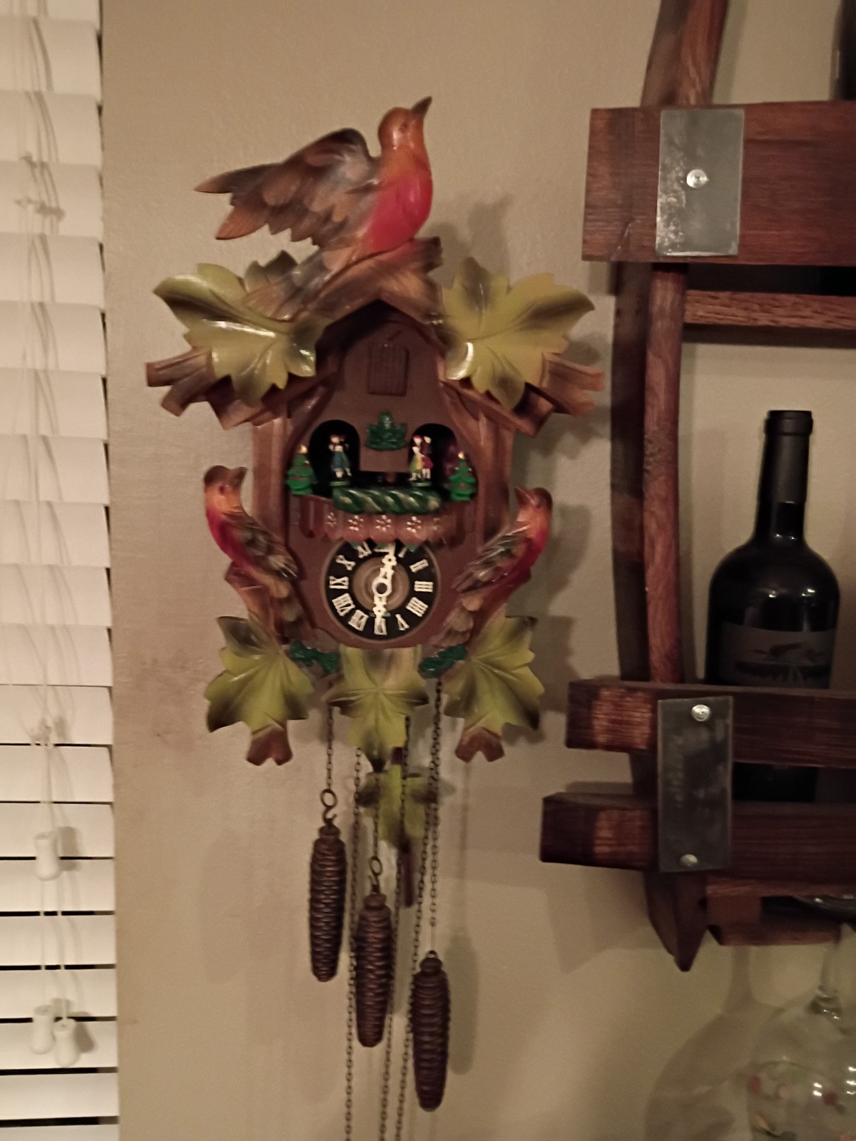 VINTAGE MUSICAL CUCKOO CLOCK WITH CAROUSEL DANCERS.........W