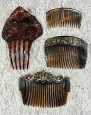 4 antique and vintage ornamental hair combs, featuring styles such as Victorian