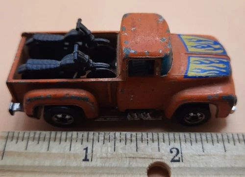 Vintage 1973 Hot Wheels Orange Truck with 2 motorcycles in back Hong Kong