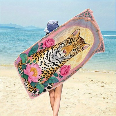 A Beach Towel Featuring a Leopard Flower Design That Is Soft, Absorbent, Light