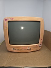 2003 13" hello kitty tv. NOT WORKING. NEEDS CORD. HAS CRACKS. SEE PICS.