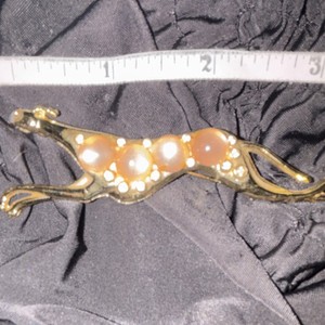 Vintage Gold toned pink jelly belly with rhinestones greyhound brooch