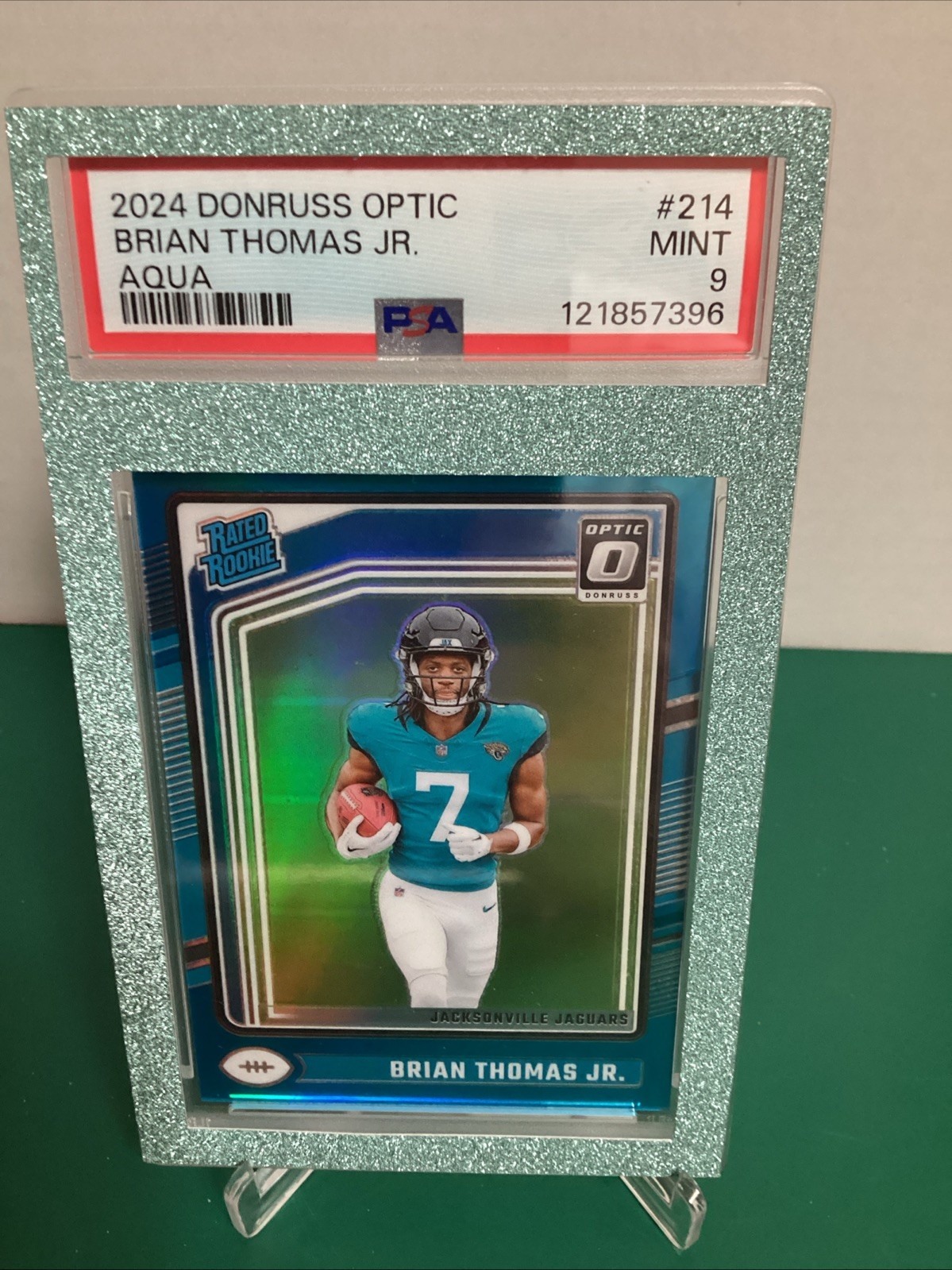 2024 Panini Donruss Optic - Rated Rookie Brian Thomas Jr. #214 Aqua PSA 9 /299