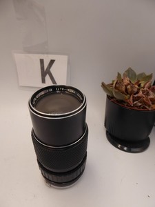 Olympus Zuiko 75-150mm f/4 Lens lens  working but has haze. still usable