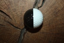 VINTAGE BLACK AND WHITE PING GOLF BALL