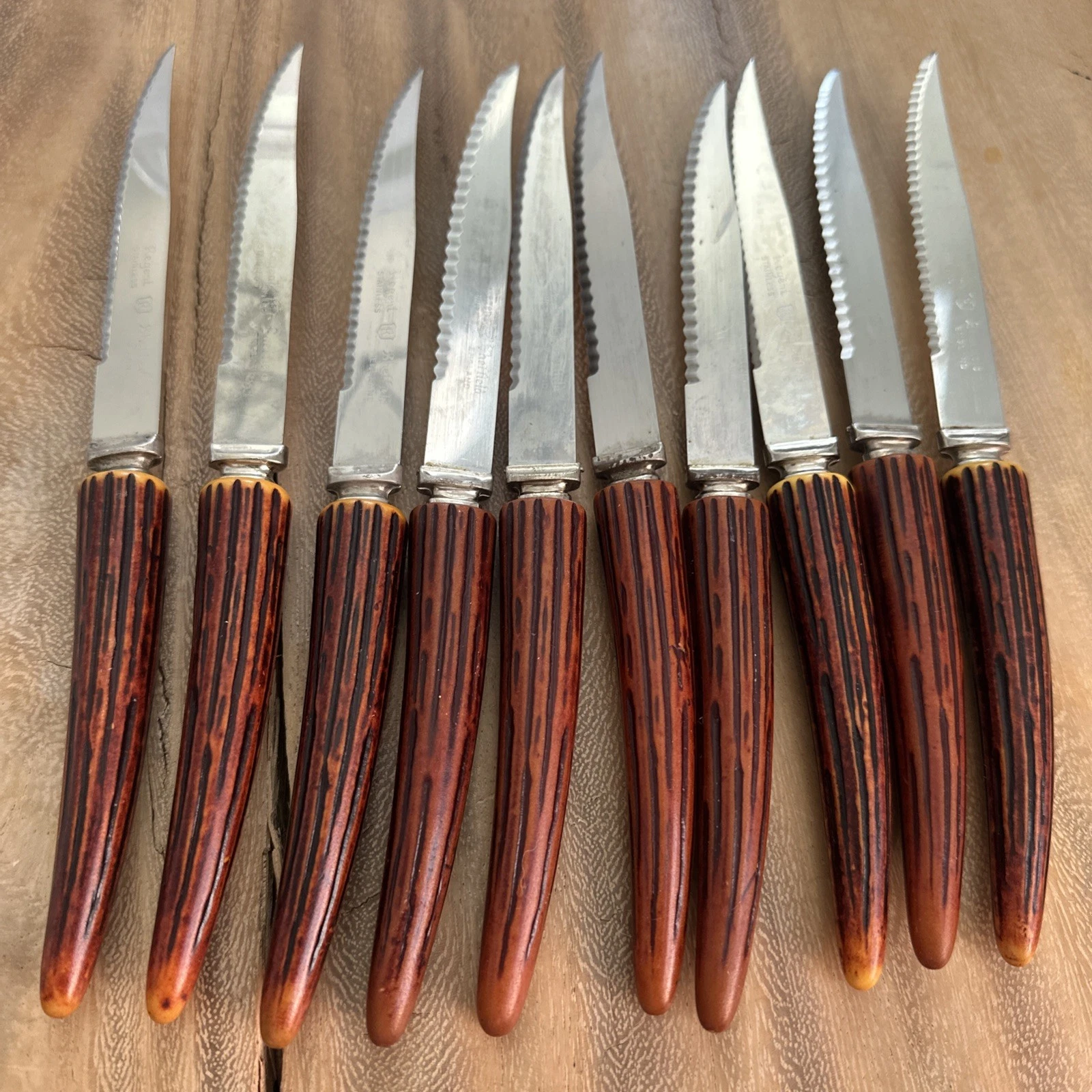 VTG 10 Faux Wood Antler Regent Sheffield England Bakelite Serrated Steak Knives
Opens in a new windo