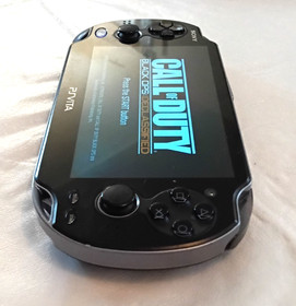 Sony PS Vita PCH-1101 System With Sony Charger & Call Of Duty Black Ops Declassi