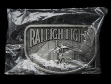 LA15150 NOS VINTAGE 1970s  RALEIGH LIGHTS   SEMI-TRUCK BELT BUCKLE