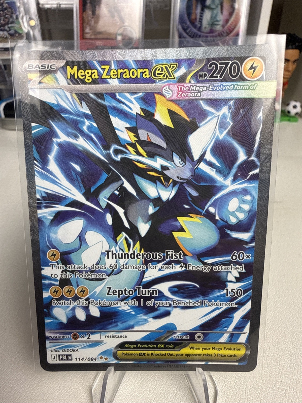 Mega Zeraora ex 114/084 Me05: Pitch Black Holo