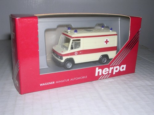 HERPA #4121 Mercedes furgoneta de rescate con luces de emergencia en el techo "H.O." 1/87 | Zustand: New